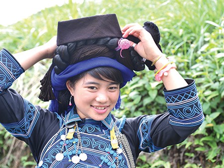 Cвоеобразная традиционная одежда народности Хани - ảnh 3